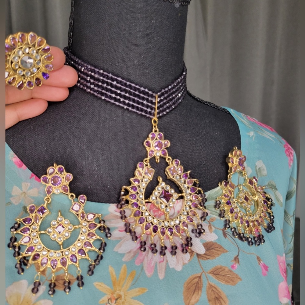A beautiful purple set with earrings. Choker necklace and ring